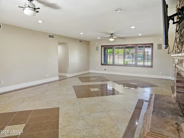a view of a park with large trees