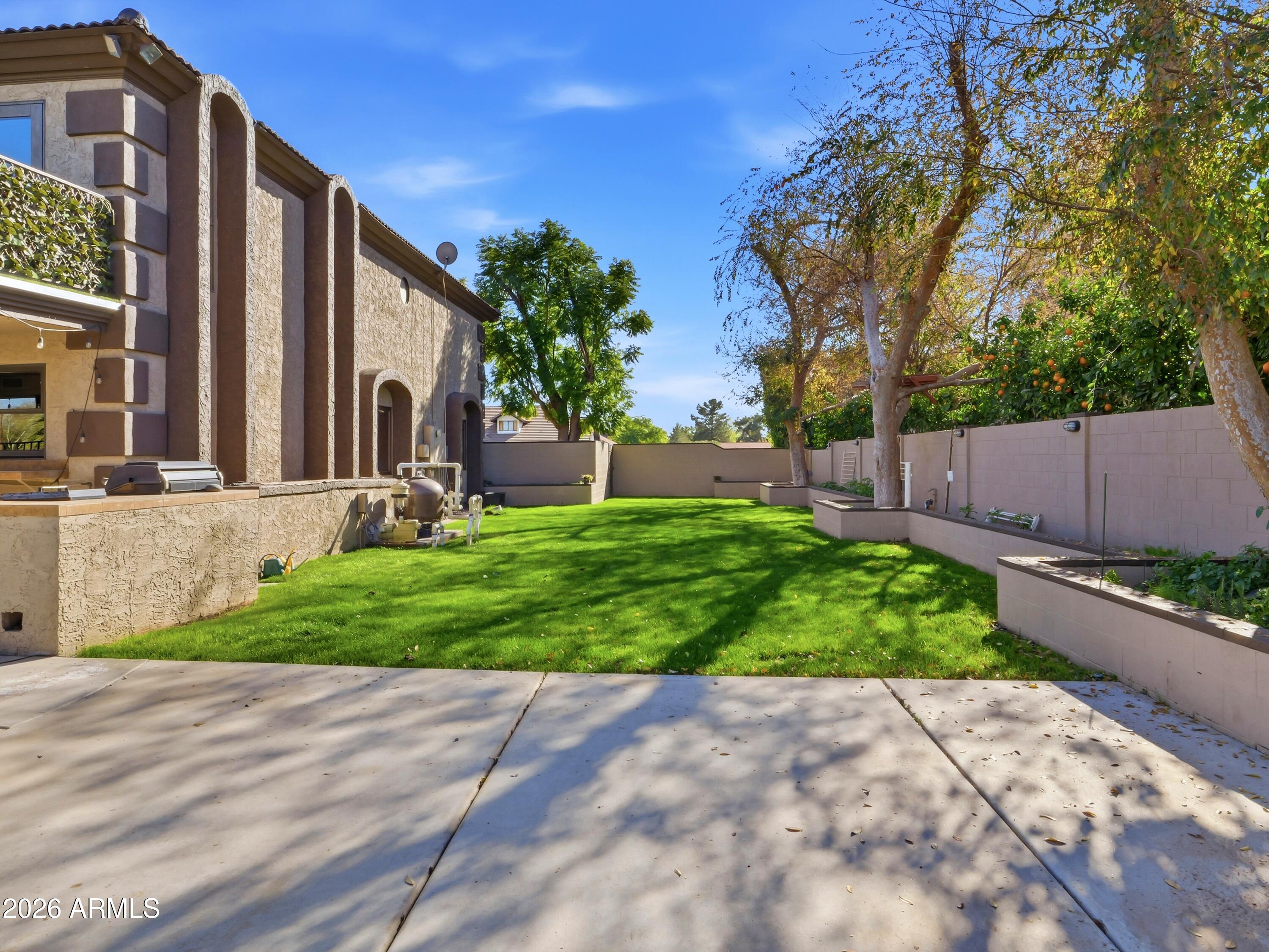3154 East Inverness Avenue Mesa, AZ 85204 - Photo 24 of 70 a front view of a house with garden
