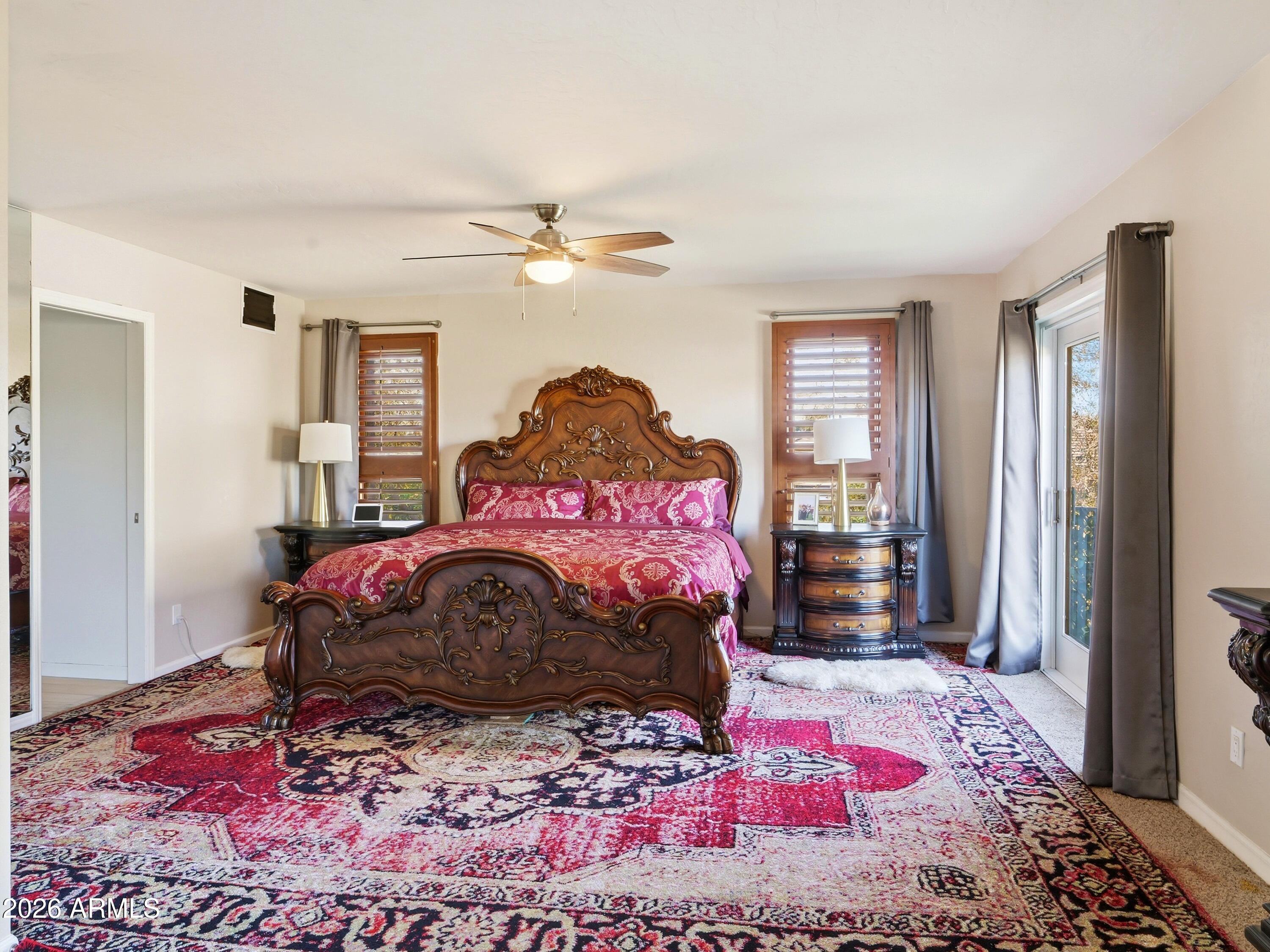 3154 East Inverness Avenue Mesa, AZ 85204 - Photo 50 of 70 a bedroom with a bed dresser and a window