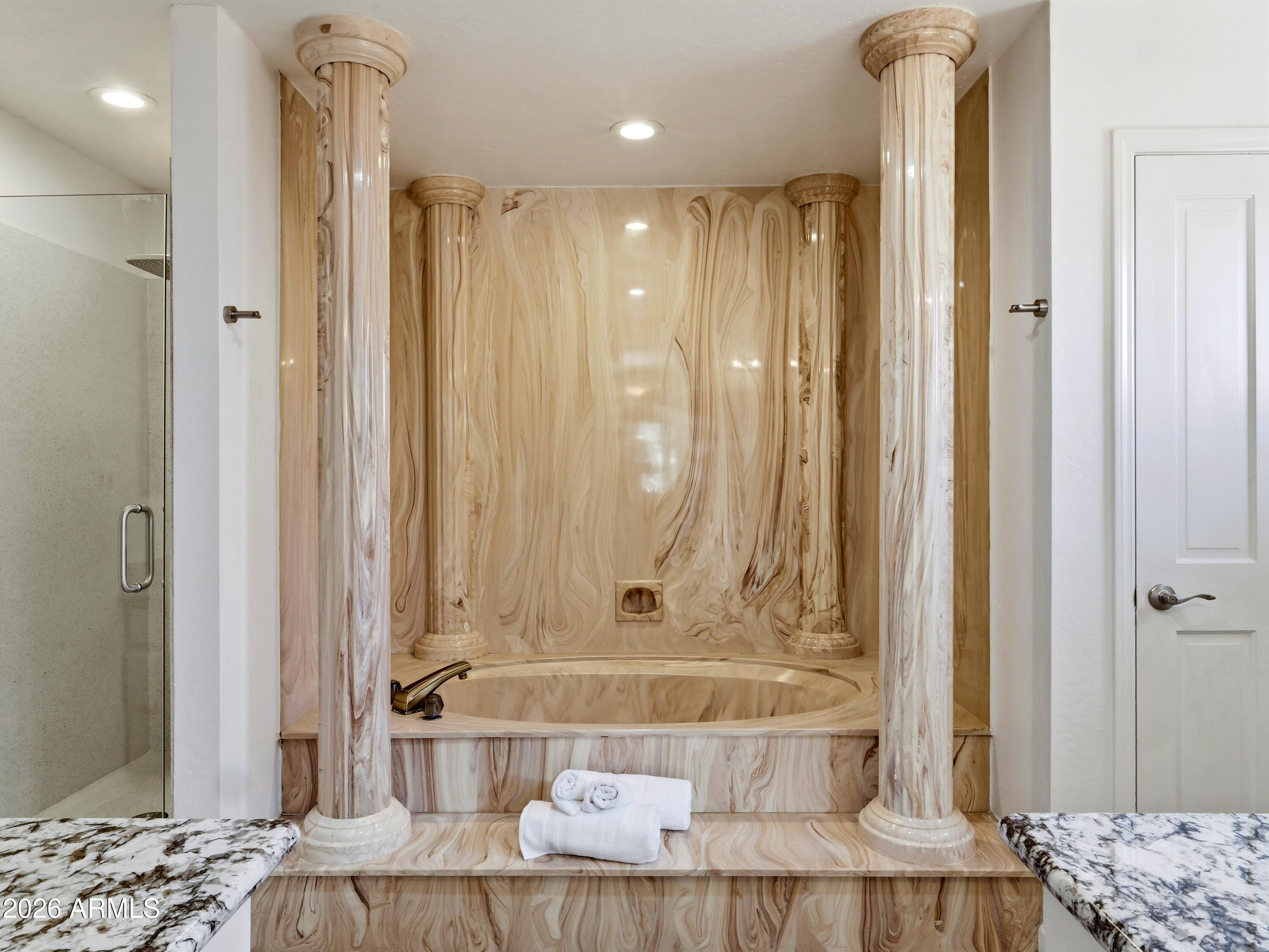 3154 East Inverness Avenue Mesa, AZ 85204 - Photo 58 of 70 a bathroom with a tub and a shower