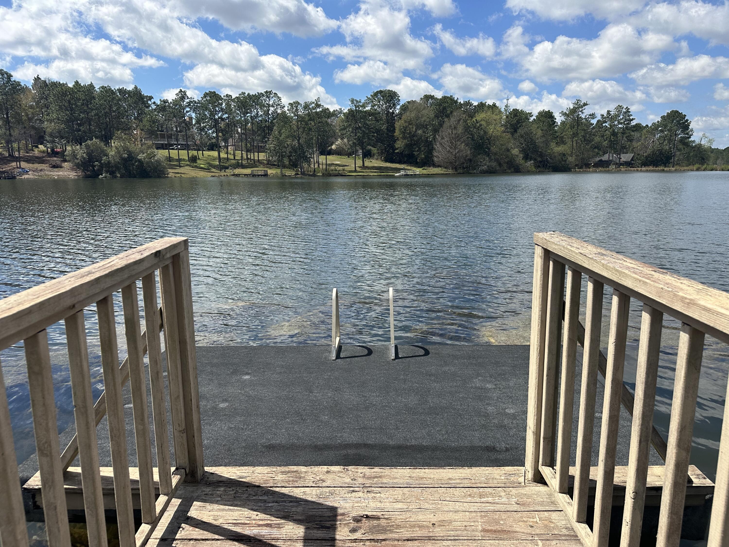 486 Ridge Lake Road Crestview, FL 32536 - Photo 16 of 87 a view of a lake from a balcony