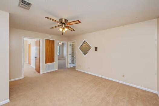 486 Ridge Lake Road Crestview, FL 32536 - Photo 46 of 87 a view of a livingroom with a ceiling fan and window