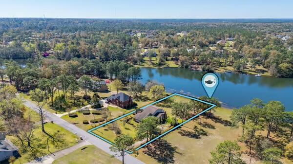 486 Ridge Lake Road Crestview, FL 32536 - Photo 68 of 87 an aerial view of a house with a lake view