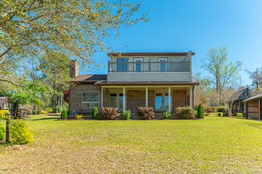 486 Ridge Lake Road Crestview, FL 32536 - Photo 8 of 87 a front view of house with outdoor seating