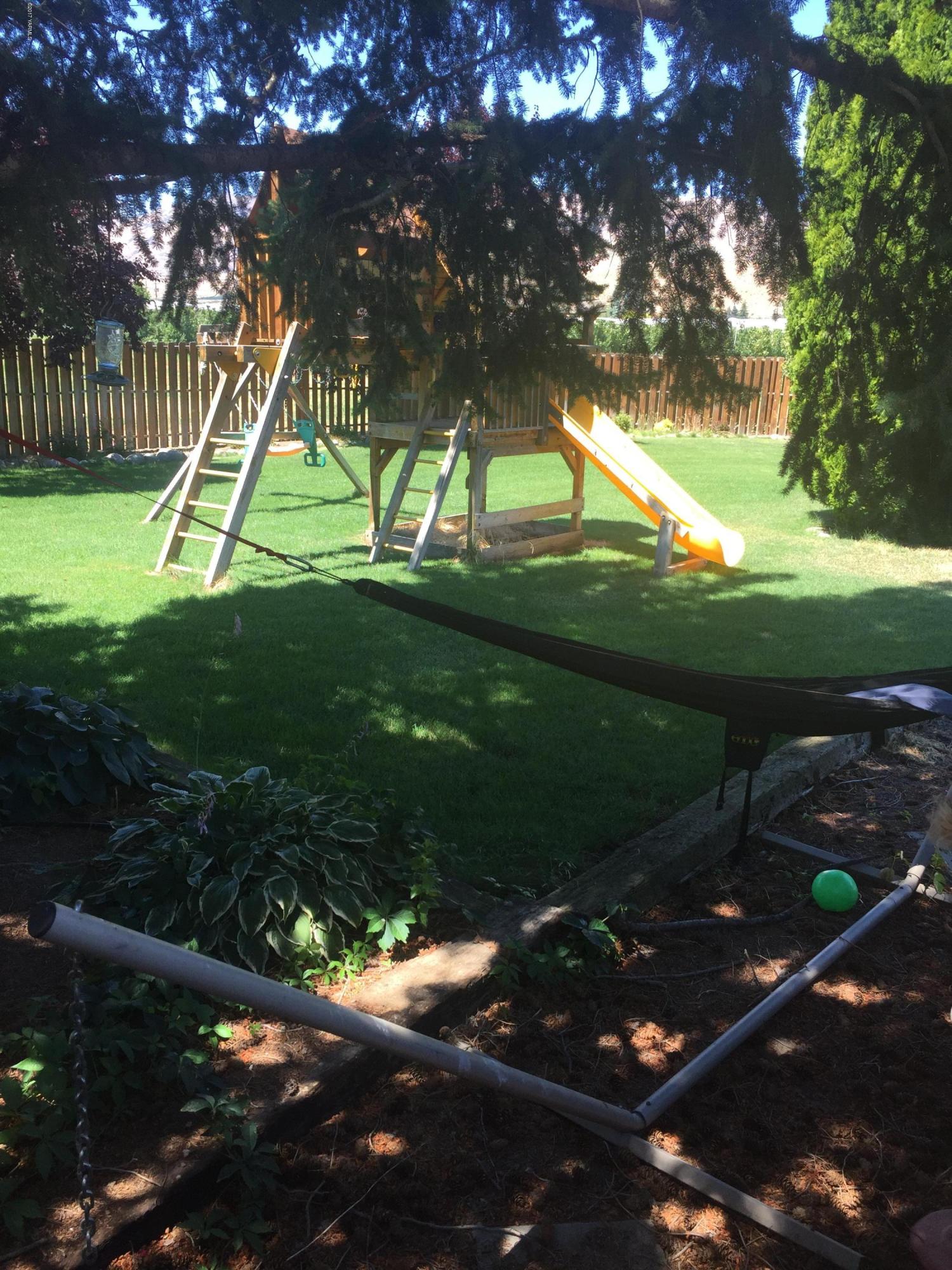 431 Allan Road Naches, WA 98937 - Photo 12 of 50 a view of swimming pool is middle in the garden