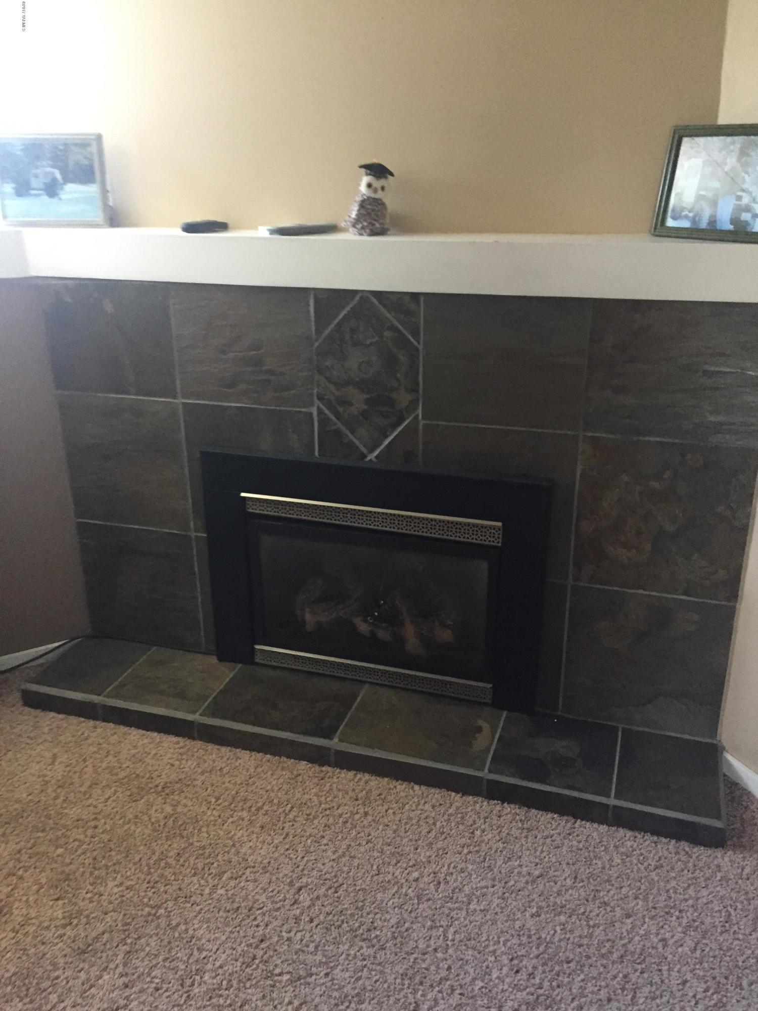 431 Allan Road Naches, WA 98937 - Photo 24 of 50 a living room with a fireplace