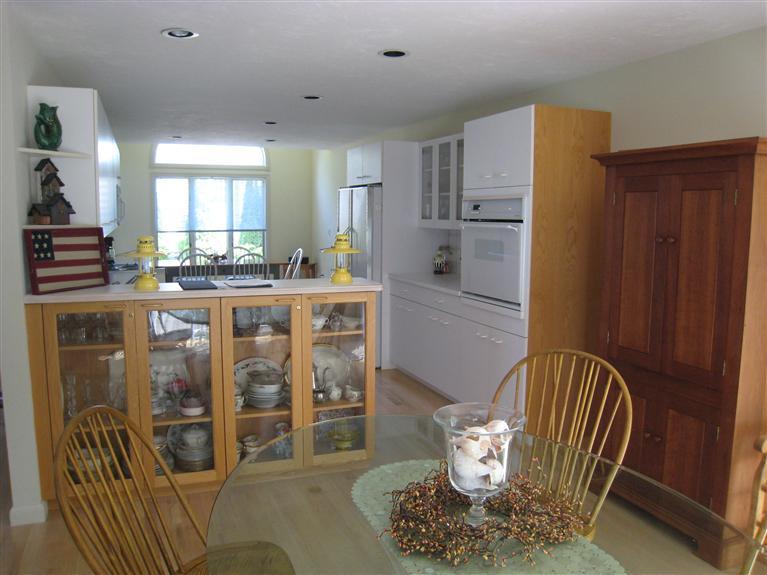 39 Summersea Road Mashpee, MA 02649 - Photo 11 of 18 a kitchen with stainless steel appliances granite countertop a table and chairs