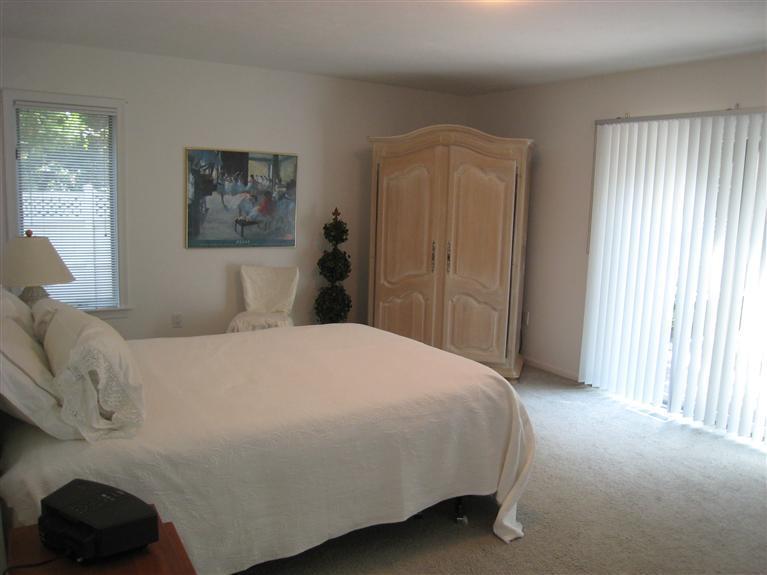 39 Summersea Road Mashpee, MA 02649 - Photo 14 of 18 a bedroom with a bed and a window