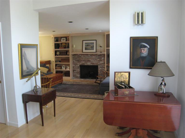 39 Summersea Road Mashpee, MA 02649 - Photo 6 of 18 a living room with furniture and a fireplace