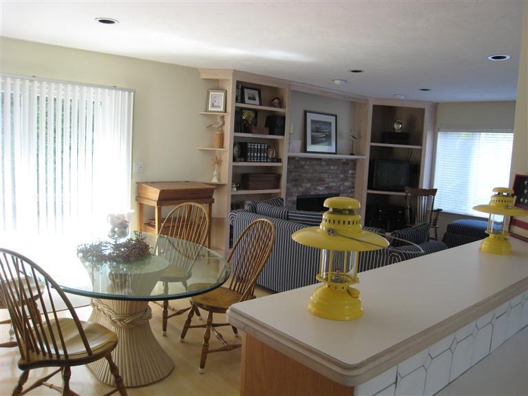 39 Summersea Road Mashpee, MA 02649 - Photo 9 of 18 a dining room with furniture and wooden floor