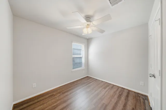 a bathroom with a sink toilet and vanity