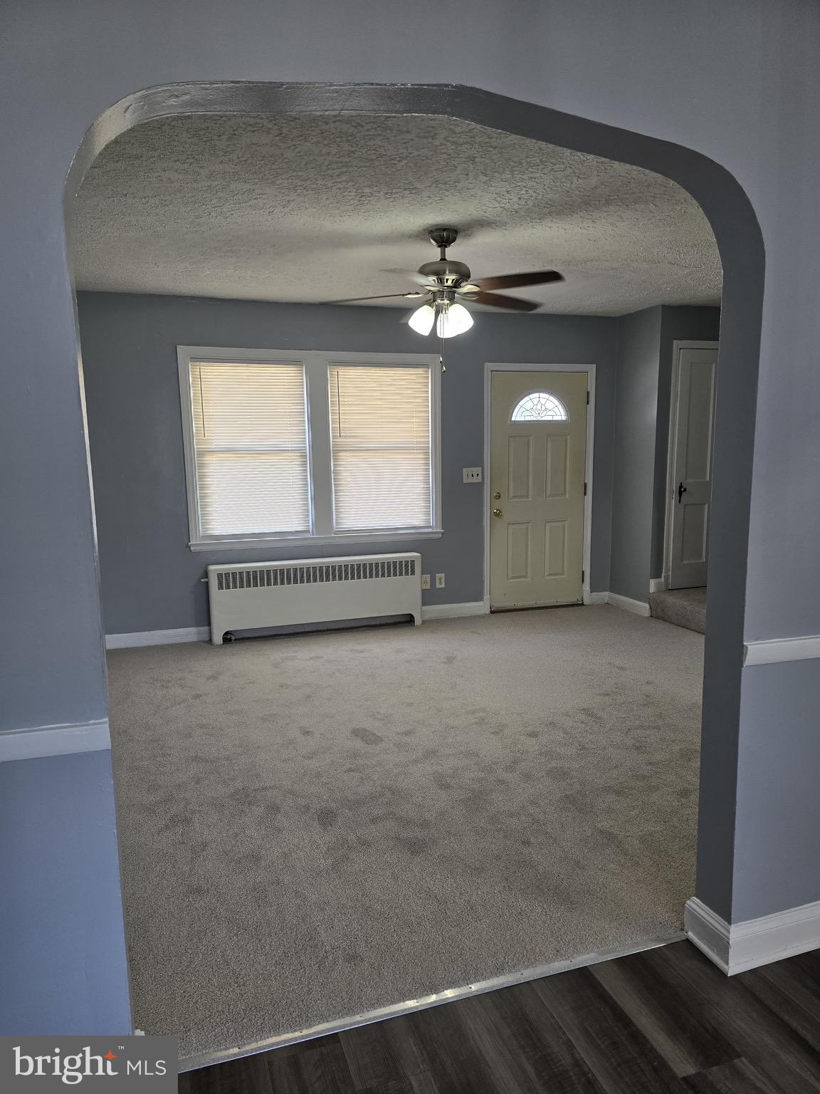 6105 Frederick Road Catonsville, MD 21228 - Photo 7 of 38 a view of empty room with a ceiling fan