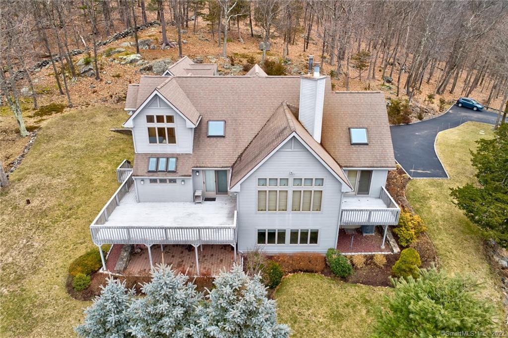 149 Ledges Road Ridgefield, CT 06877 - Photo 1 of 1 front view of a house with a small yard