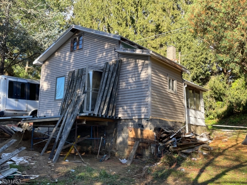 48 Cherry Tree Bend Road Port Murray, NJ 07865 - Photo 11 of 26 a front view of a house with parking space