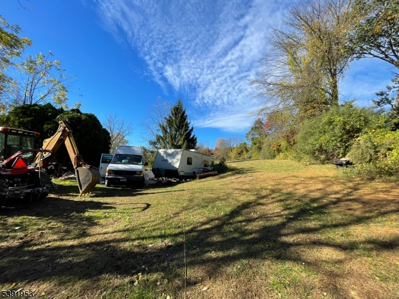48 Cherry Tree Bend Road Port Murray, NJ 07865 - Photo 13 of 26 a view of a lake with a house