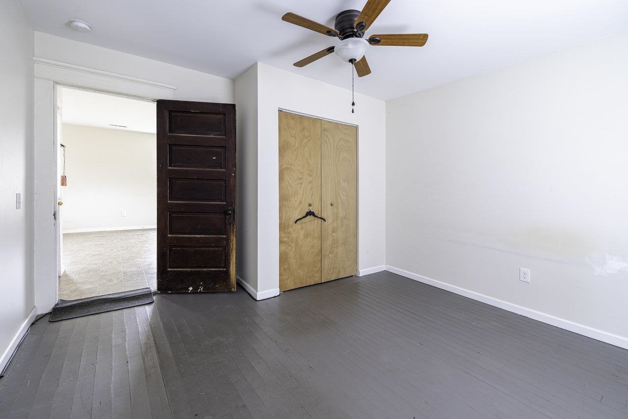 8120 Winestore Road Timberville, VA 22853 - Photo 14 of 35 an empty room with closet and a ceiling fan
