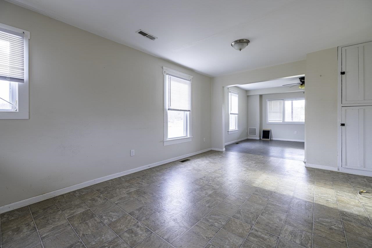 8120 Winestore Road Timberville, VA 22853 - Photo 6 of 35 an empty room with windows and entrance