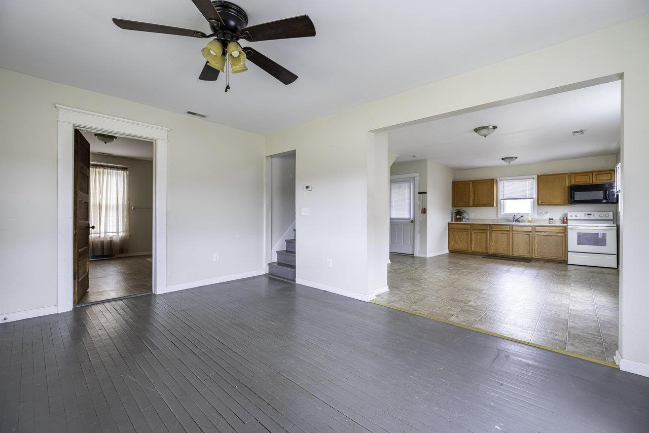 8120 Winestore Road Timberville, VA 22853 - Photo 10 of 35 a view of an empty room with window and wooden floor