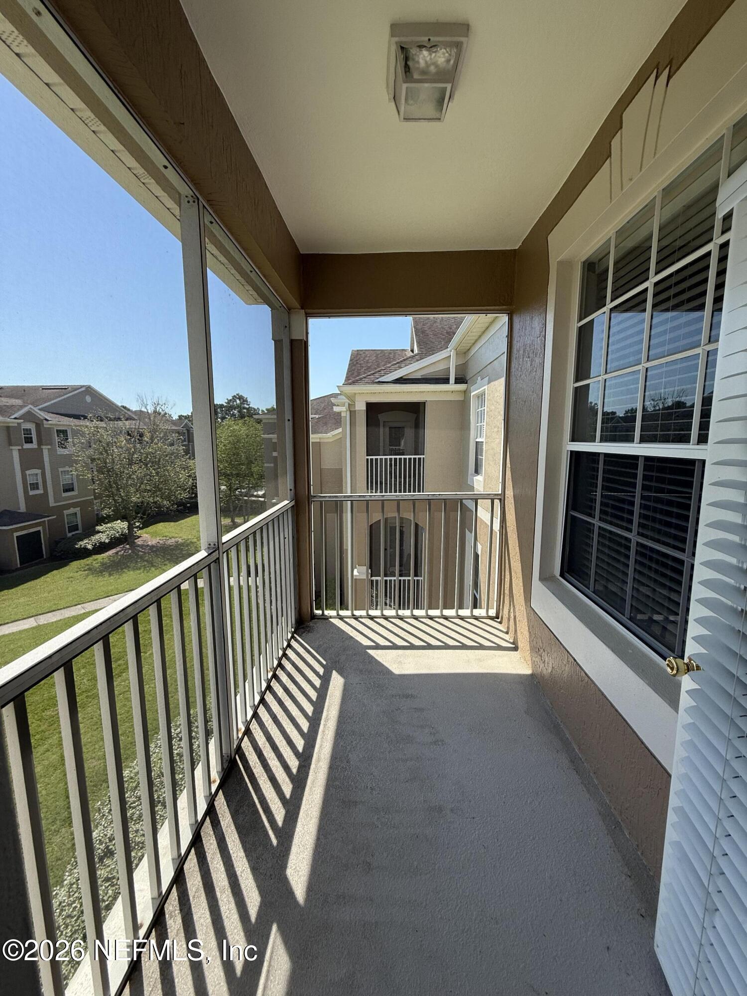 7990 Baymeadows Road, Unit 829 Jacksonville, FL 32256 - Photo 13 of 34 a view of house with furniture and front door