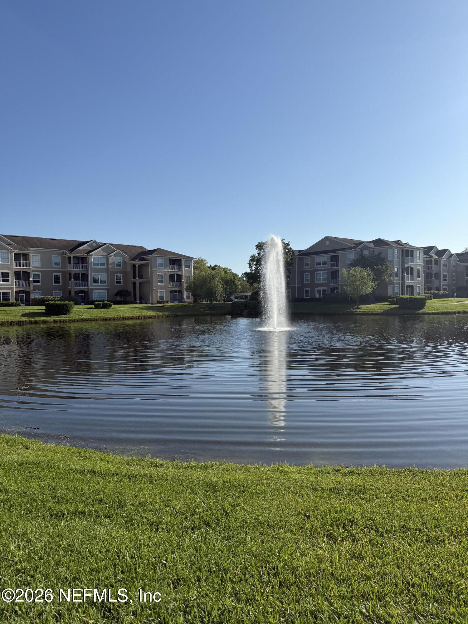 7990 Baymeadows Road, Unit 829 Jacksonville, FL 32256 - Photo 16 of 34 a view of a lake with houses