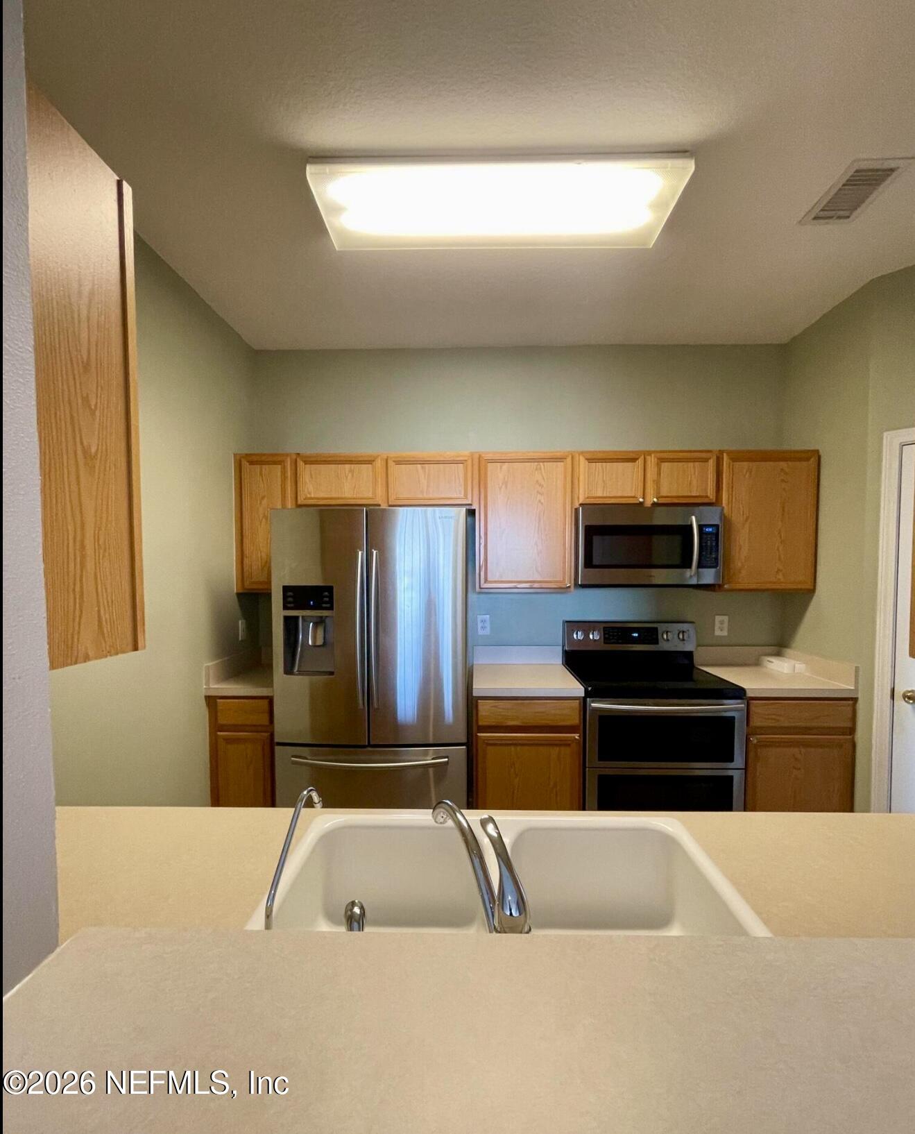 7990 Baymeadows Road, Unit 829 Jacksonville, FL 32256 - Photo 8 of 18 IMG_2195