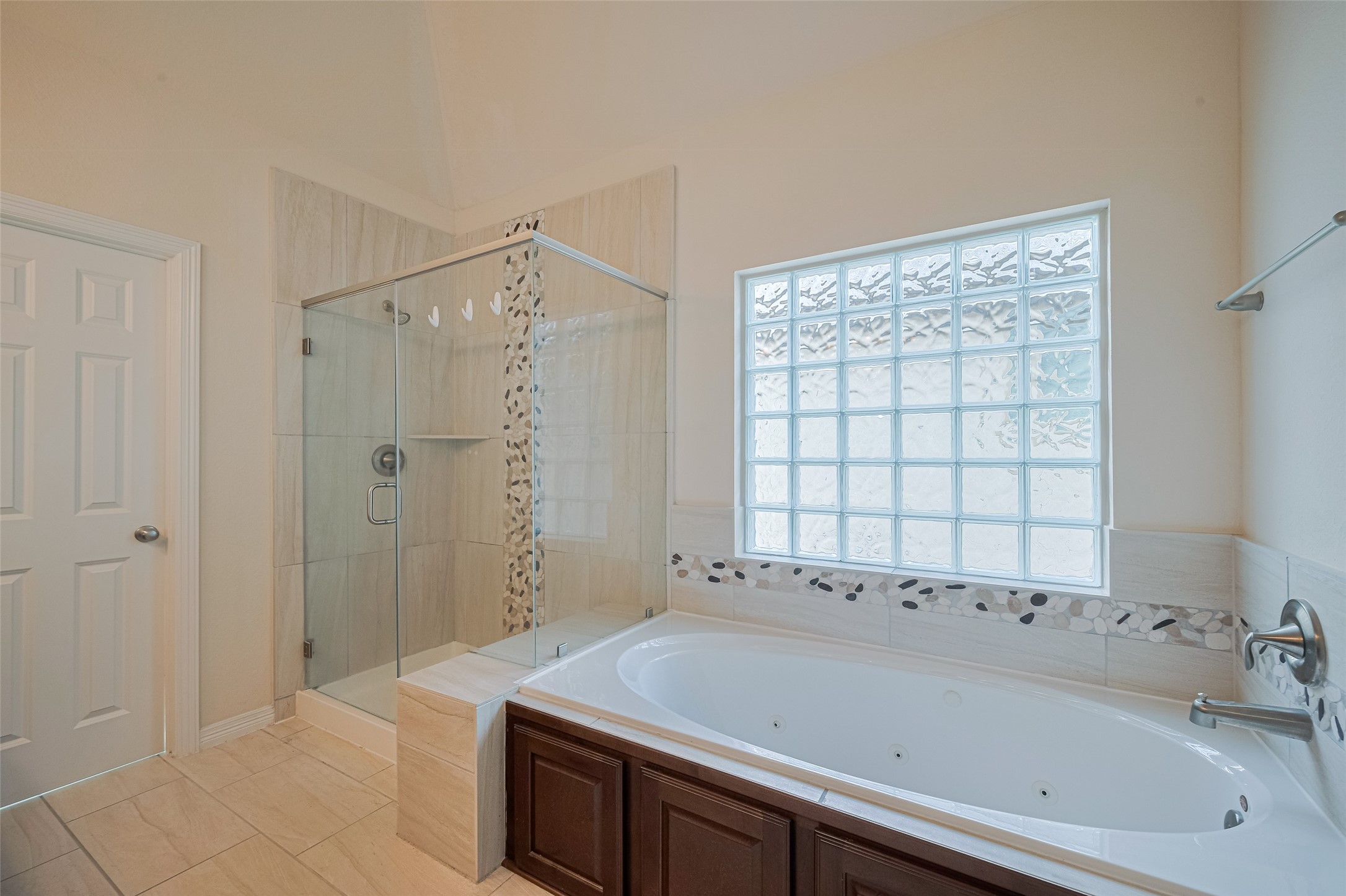 10004 Spring Shadows Park Circle Houston, TX 77080 - Photo 40 of 50 a bathroom with a tub sink and shower