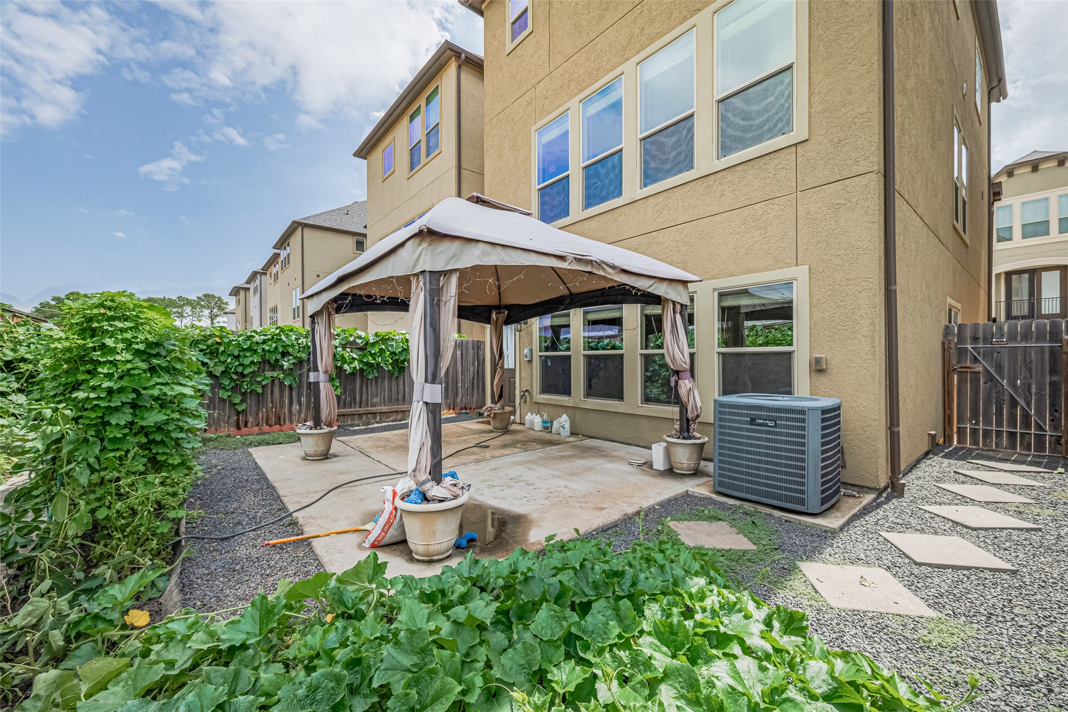 10004 Spring Shadows Park Circle Houston, TX 77080 - Photo 50 of 50 a view of a chair and table in backyard of the house