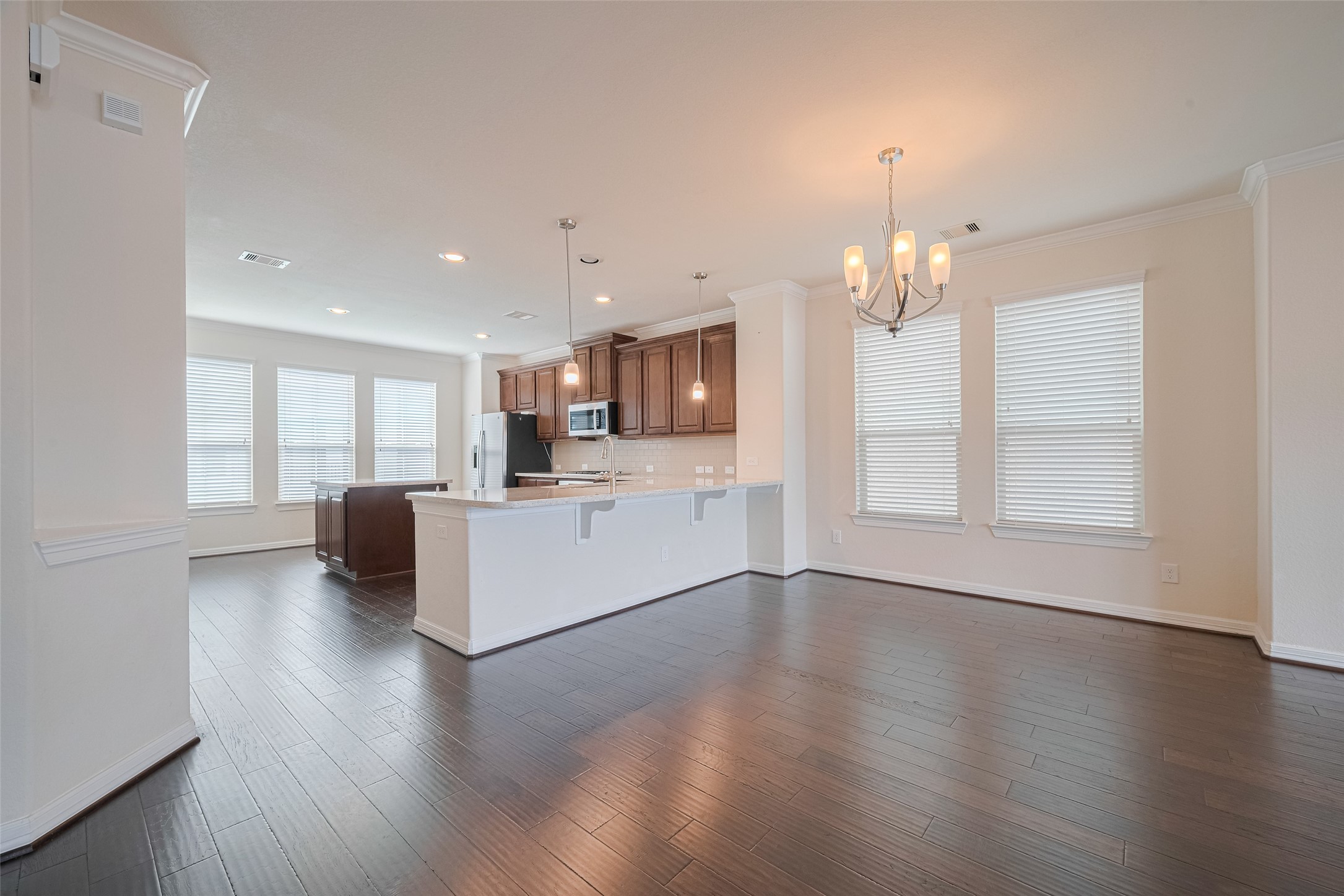 10004 Spring Shadows Park Circle Houston, TX 77080 - Photo 8 of 50 a view of a kitchen with a sink and a large window
