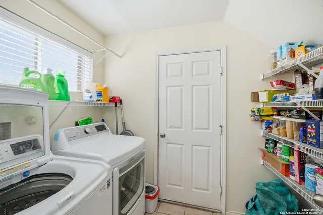 a view of storage and utility room with toys