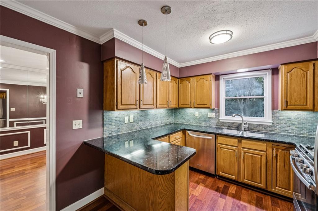 1103 Morningside Place Northeast Atlanta, GA 30306 - Photo 7 of 16 a kitchen with a sink appliances and cabinets