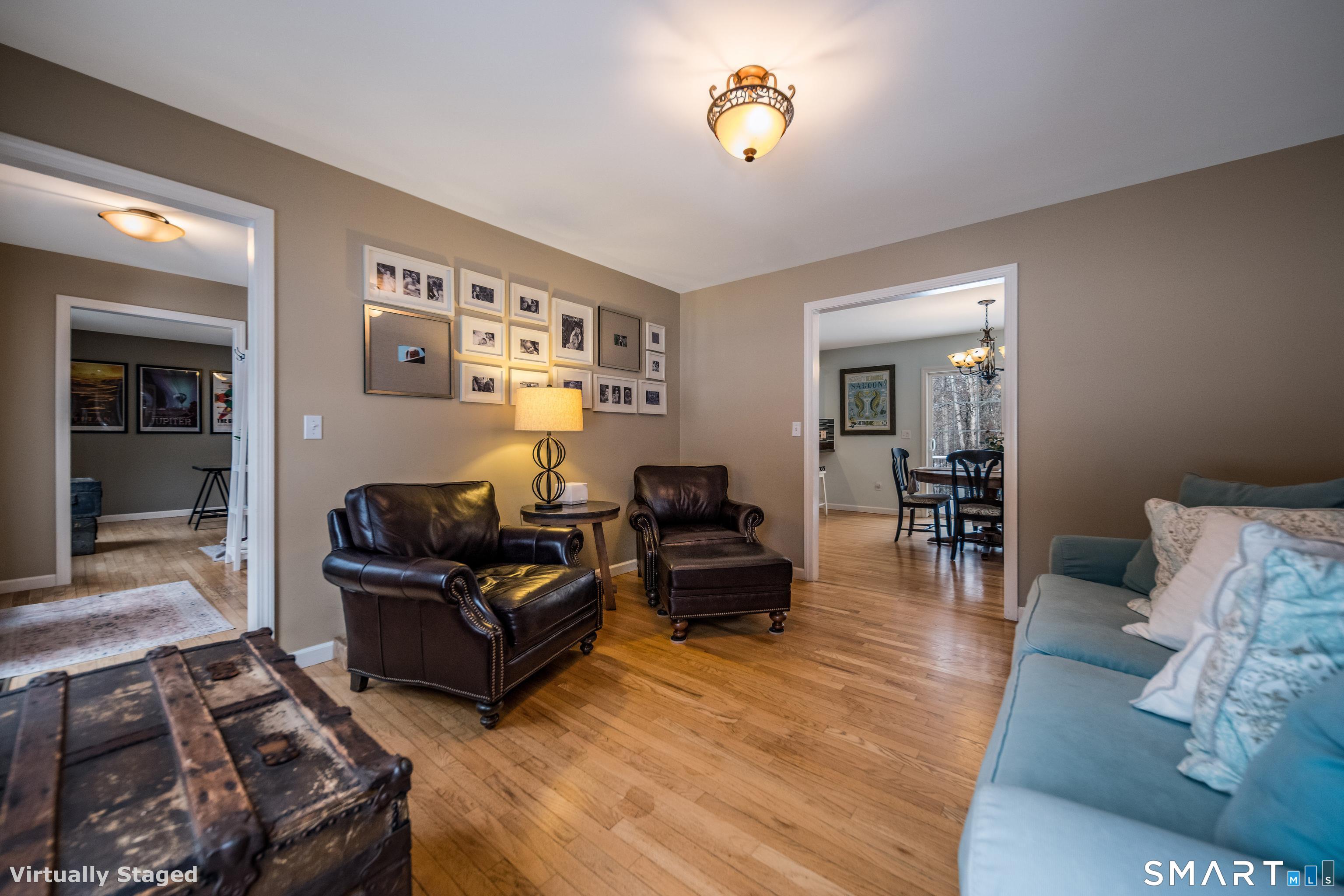 10 Stonewall Lane Clinton, CT 06413 - Photo 11 of 28 a living room with furniture