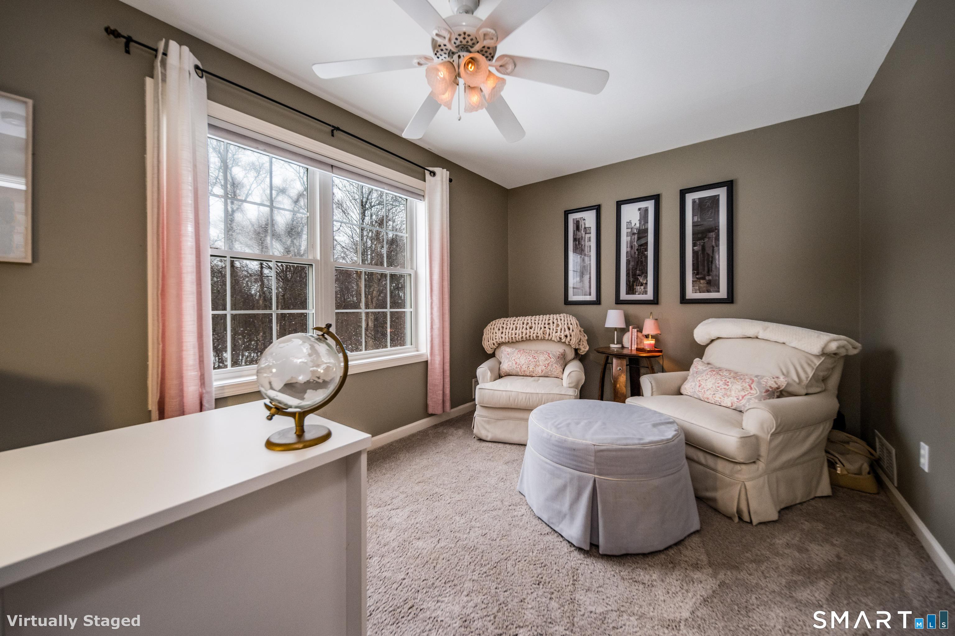 10 Stonewall Lane Clinton, CT 06413 - Photo 12 of 28 a living room with furniture and a window