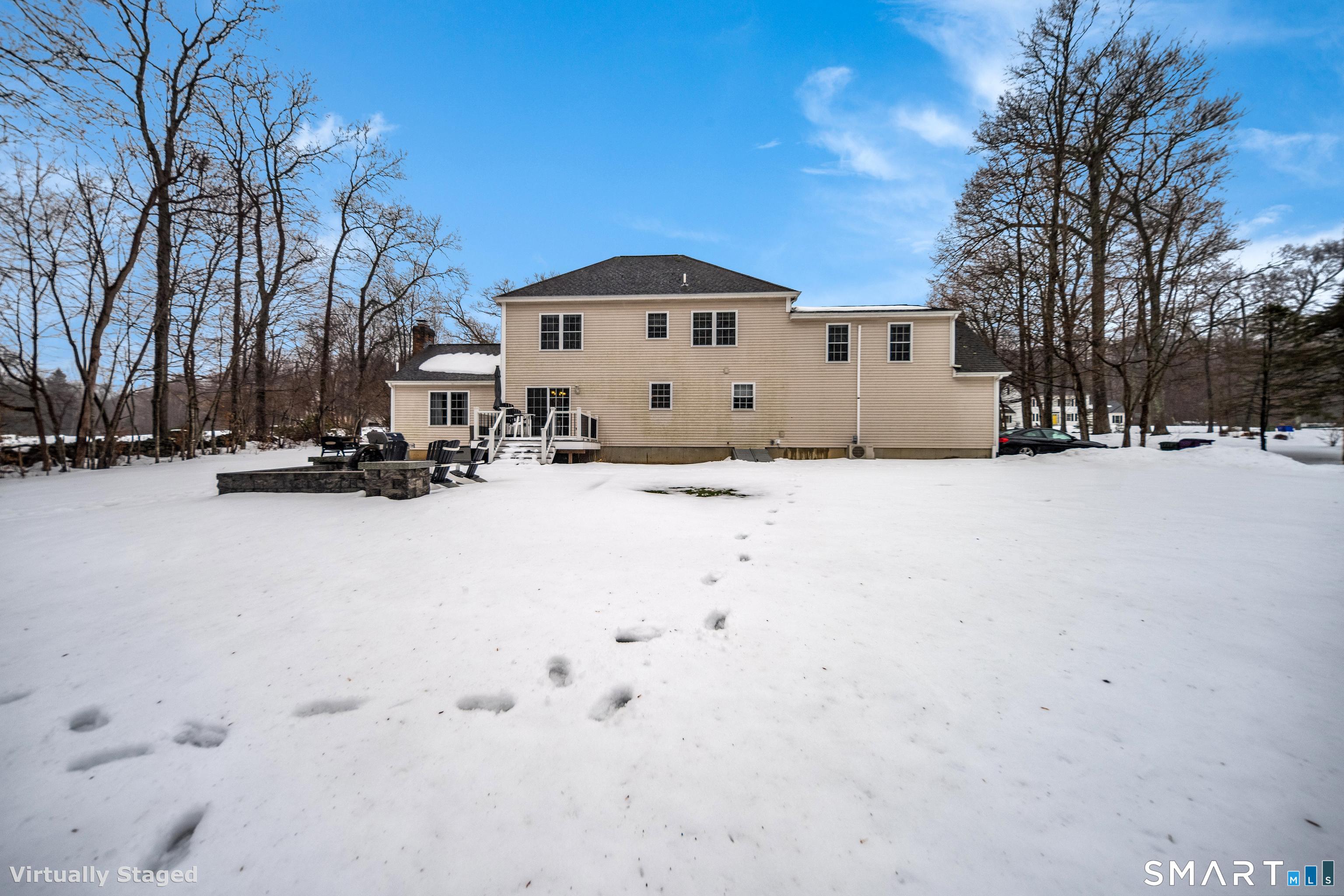 10 Stonewall Lane Clinton, CT 06413 - Photo 21 of 28 a large house with a large tree in front of it
