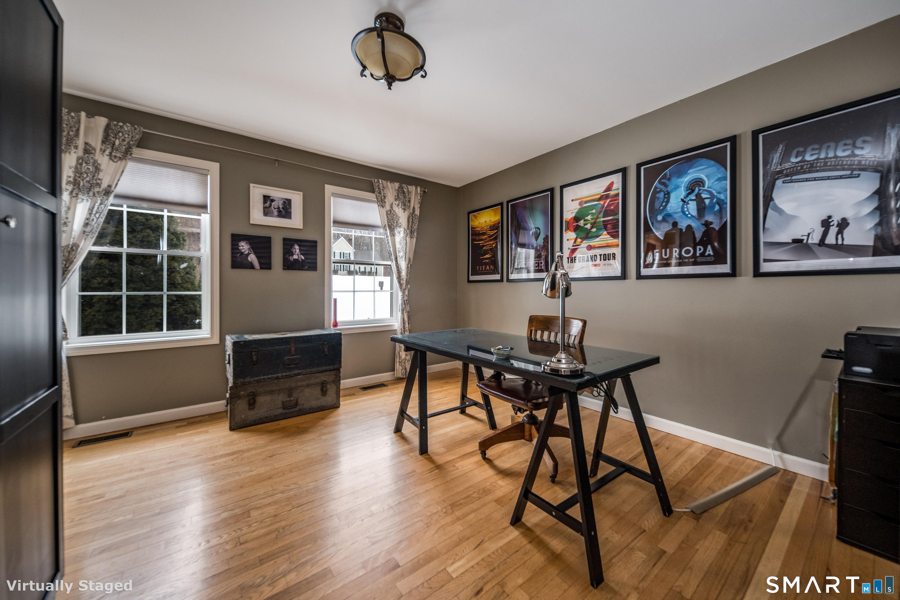 10 Stonewall Lane Clinton, CT 06413 - Photo 10 of 28 a view of a workspace with furniture window and wooden floor