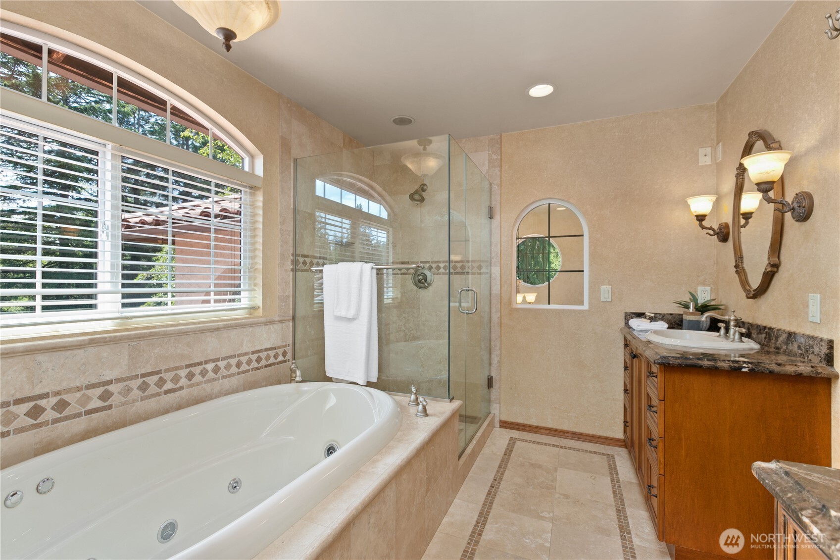 1788 Matz Road Ferndale, WA 98248 - Photo 22 of 40 a bathroom with a tub sink and mirror