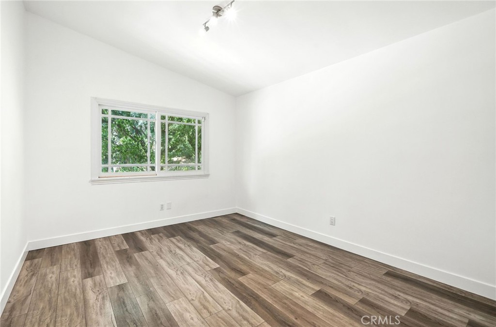4141 Coldstream Terrace Tarzana, CA 91356 - Photo 28 of 41 an empty room with a window