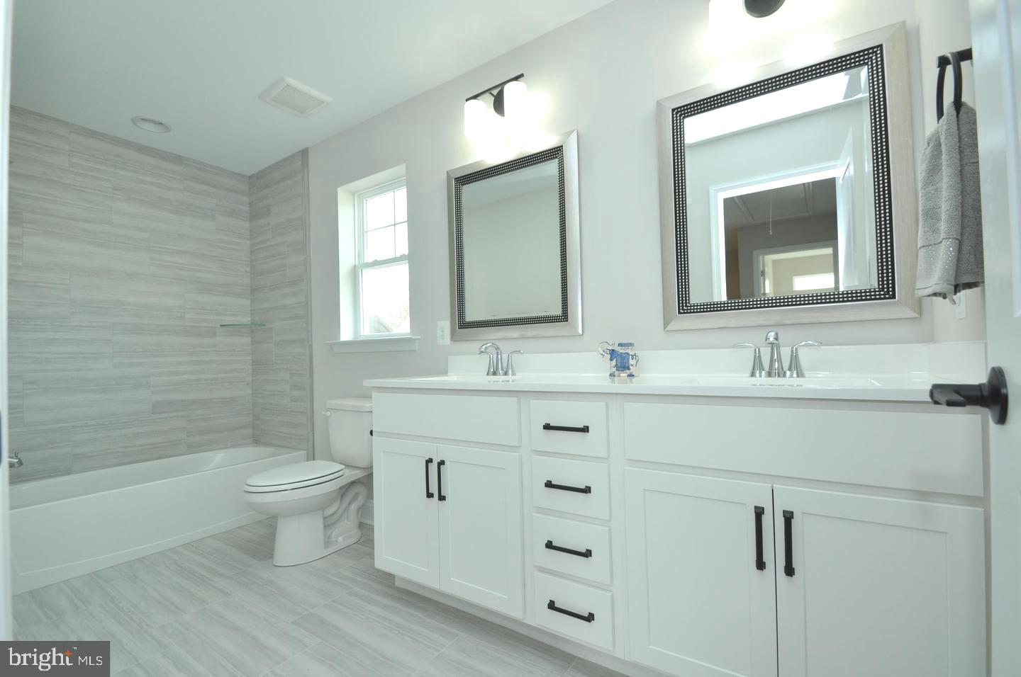 9507 Garwood Street Silver Spring, MD 20901 - Photo 12 of 25 DOUBLE VANITY HALL BATH