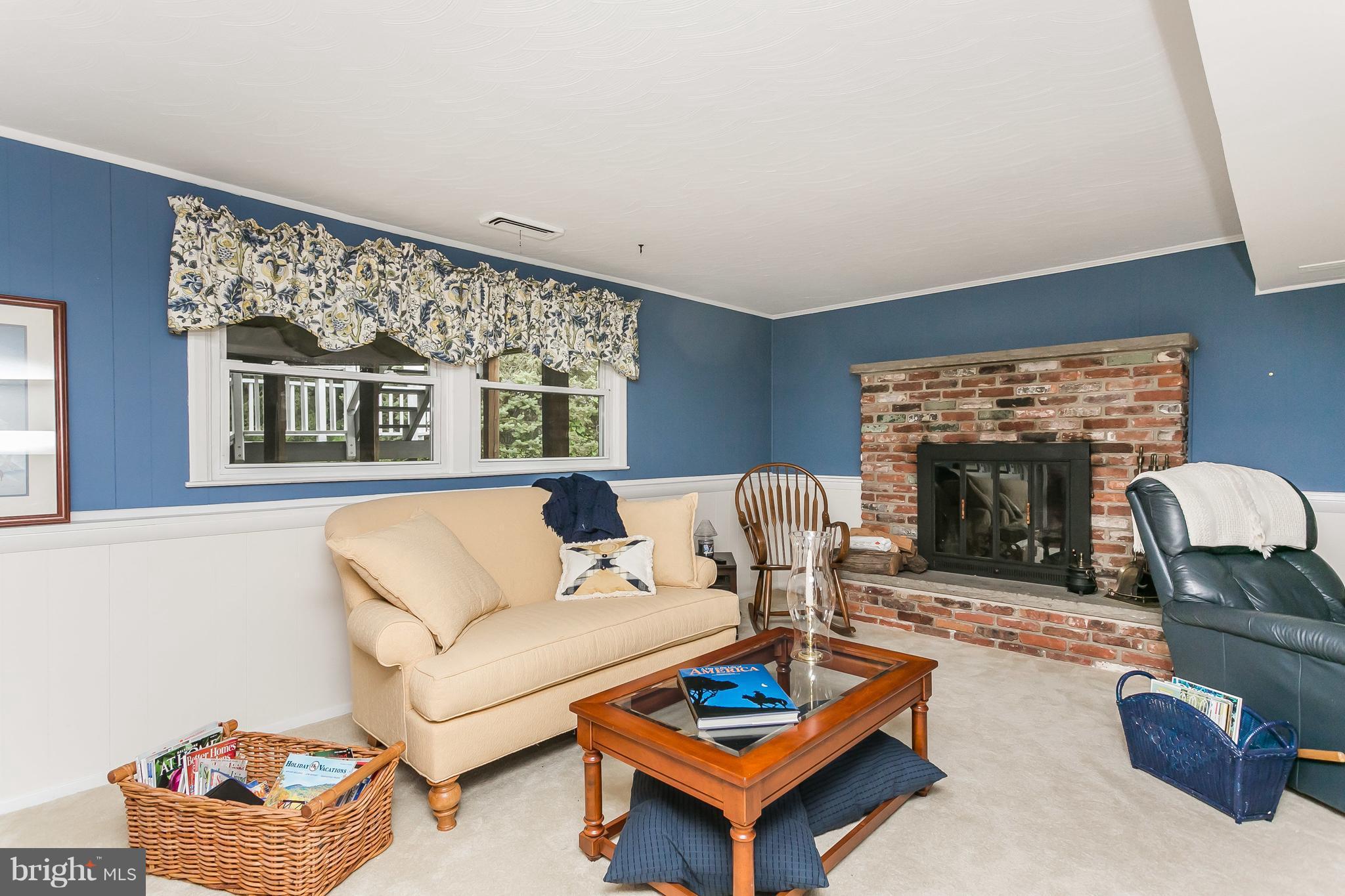 214 Locknell Road Lutherville-Timonium, MD 21093 - Photo 22 of 30 Family Room w/a cozy wood burning fireplace!