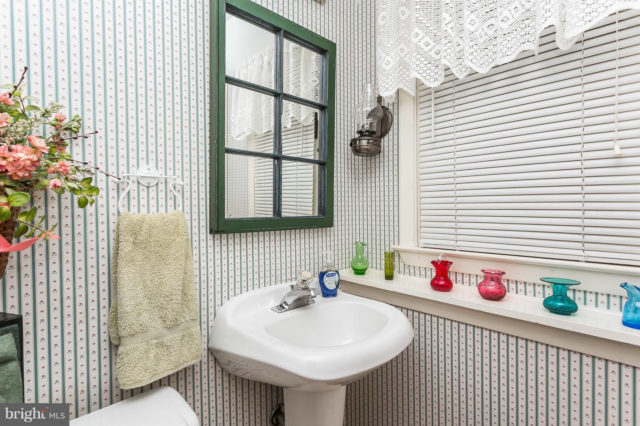 214 Locknell Road Lutherville-Timonium, MD 21093 - Photo 23 of 30 Half bath in the lower level