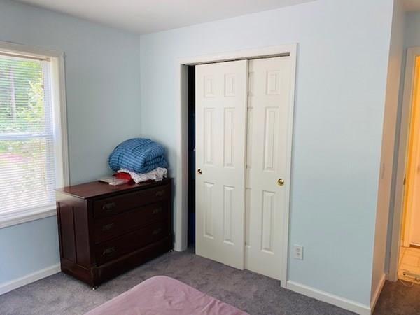 499 Beaman Road Warren, MA 01083 - Photo 21 of 40 a room with furniture and window