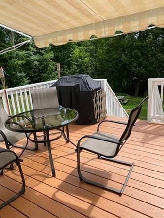 499 Beaman Road Warren, MA 01083 - Photo 34 of 40 a view of a chairs and table on the terrace