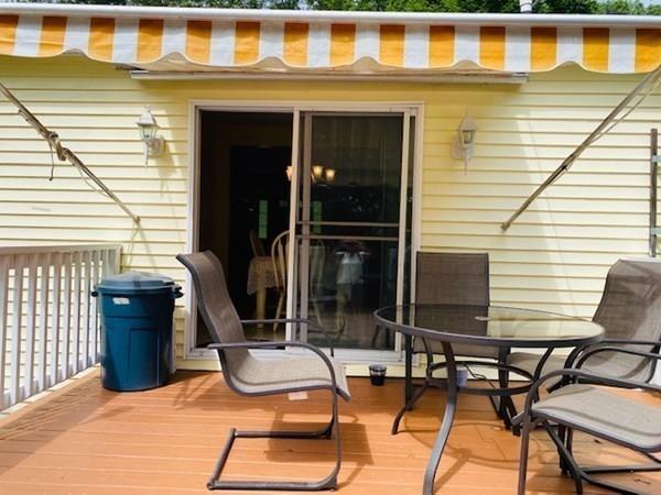 499 Beaman Road Warren, MA 01083 - Photo 35 of 40 a view of a chairs and table in the balcony