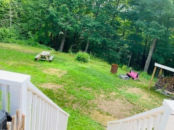 499 Beaman Road Warren, MA 01083 - Photo 36 of 40 a backyard of a house with a yard and entertaining space