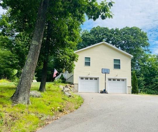 499 Beaman Road Warren, MA 01083 - Photo 6 of 40 a view of a house with a yard