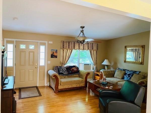 499 Beaman Road Warren, MA 01083 - Photo 7 of 40 a living room with furniture and a window