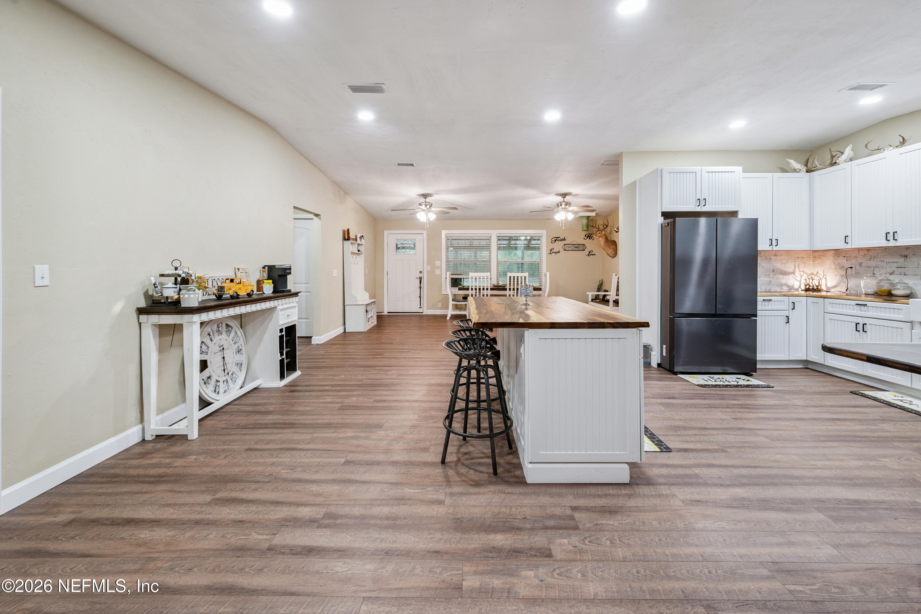 11309 Southwest 167th Circle Brooker, FL 32622 - Photo 19 of 42 a kitchen with stainless steel appliances a refrigerator and a stove top oven