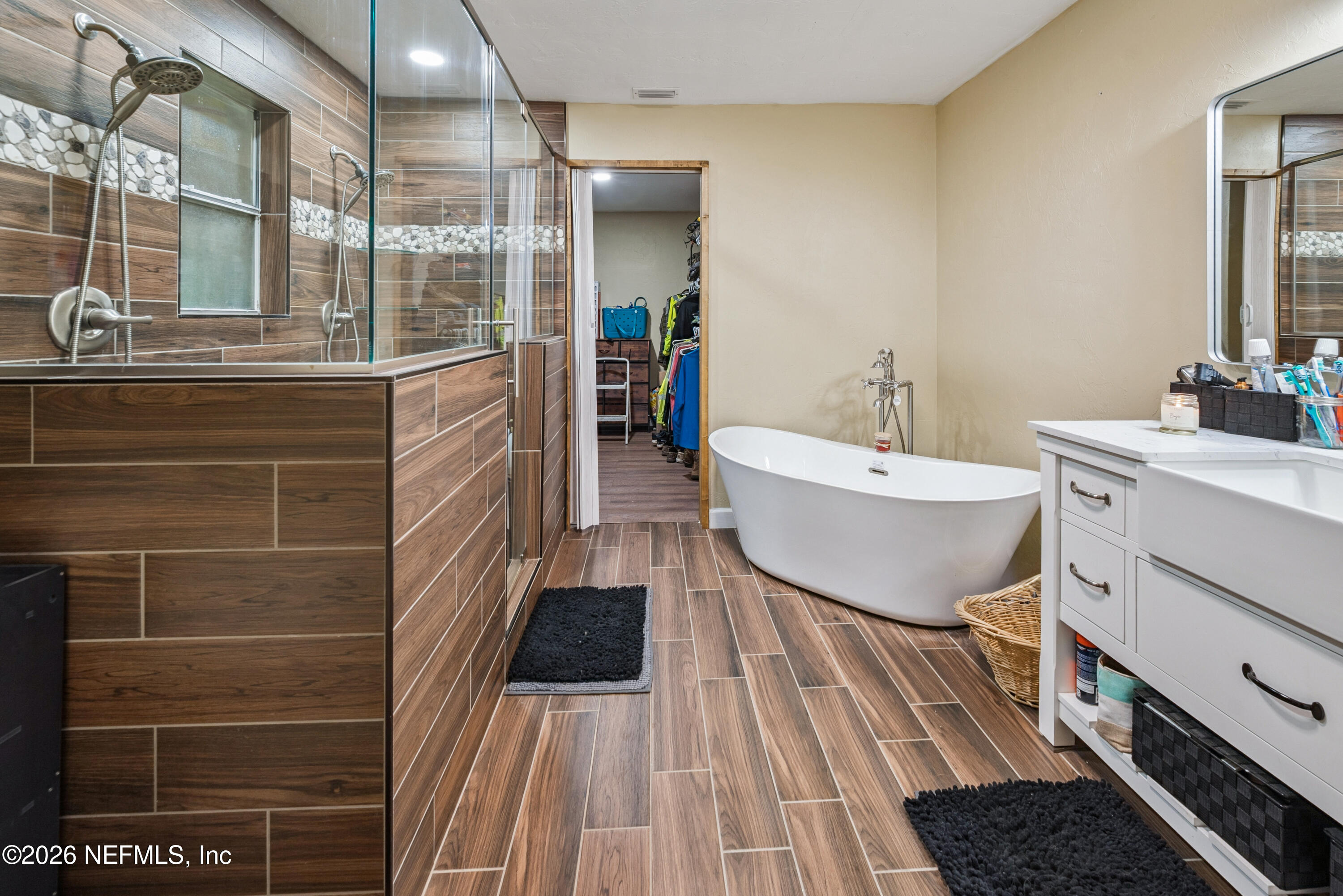 11309 Southwest 167th Circle Brooker, FL 32622 - Photo 29 of 42 a bathroom with a sink and a mirror