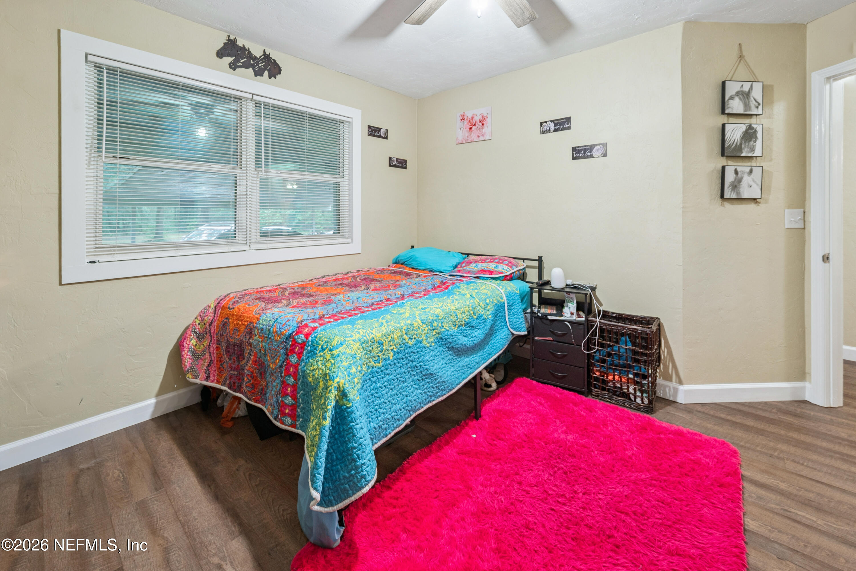 11309 Southwest 167th Circle Brooker, FL 32622 - Photo 35 of 42 a bedroom with a bed and a window