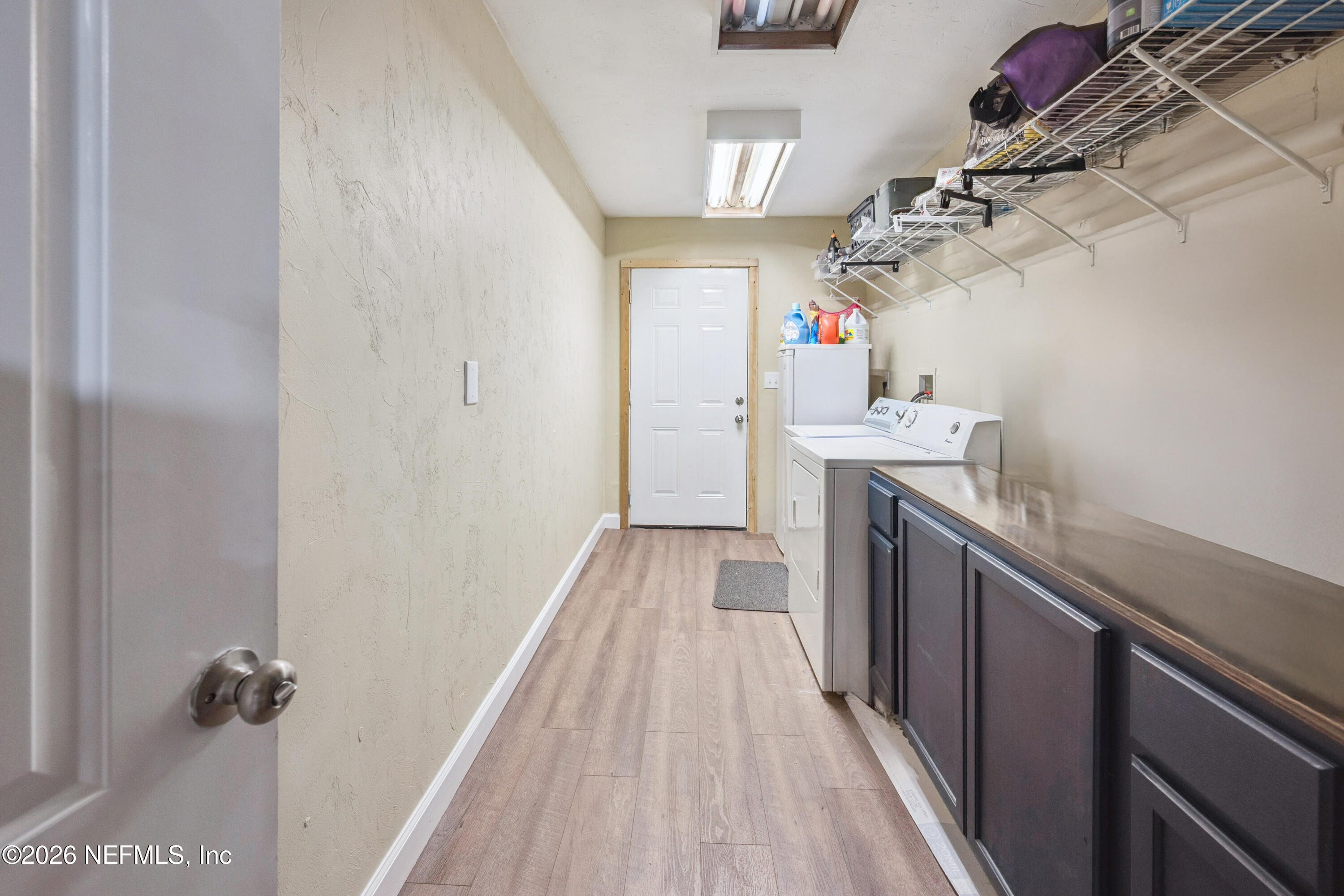 11309 Southwest 167th Circle Brooker, FL 32622 - Photo 40 of 42 a view of a kitchen from a hallway