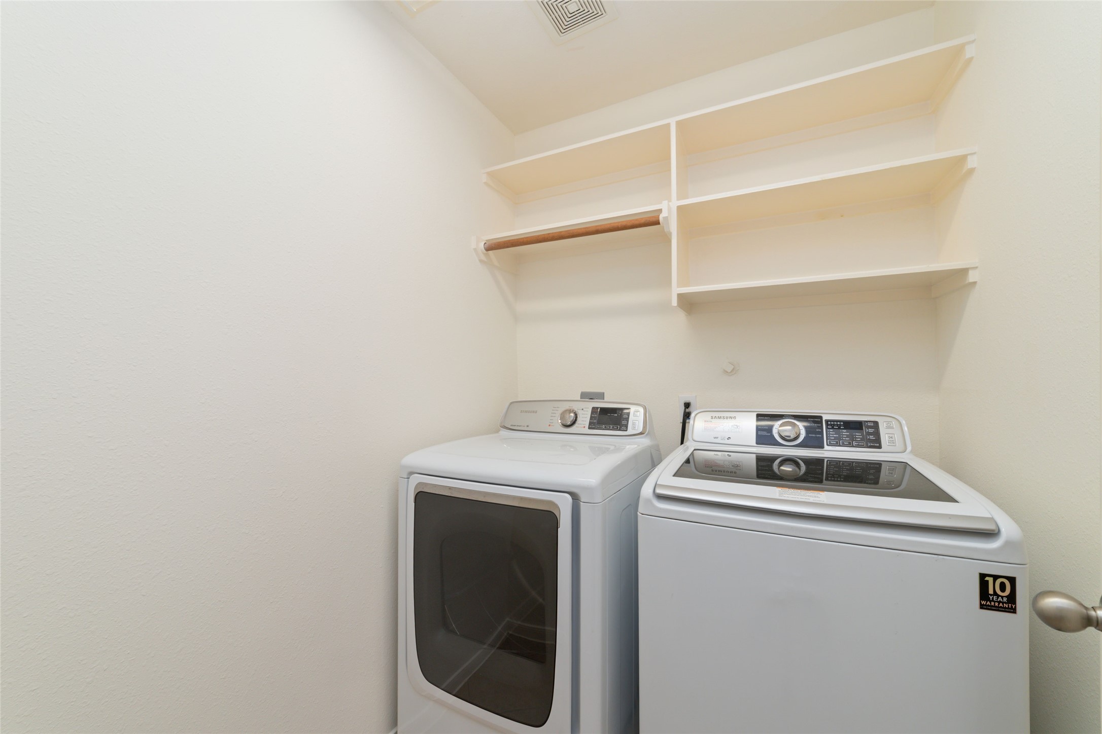 12519 East Nantucket Road Sugar Land, TX 77478 - Photo 22 of 25 a utility room with dryer and washer